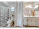 Bathroom featuring a toilet, shower, and linen closet at 961 Whisler Ct, St Cloud, FL 34769