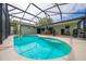 Inviting kidney-shaped pool with screened enclosure at 961 Whisler Ct, St Cloud, FL 34769