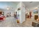 Spacious living room with wood-look floors and access to kitchen at 961 Whisler Ct, St Cloud, FL 34769