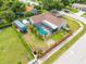 Aerial view highlighting home and pool at 961 Whisler Ct, St Cloud, FL 34769