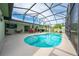 Inviting kidney-shaped pool with screened enclosure at 961 Whisler Ct, St Cloud, FL 34769