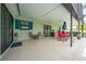 Covered patio with seating area and outdoor grill at 961 Whisler Ct, St Cloud, FL 34769