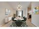 Bright dining area with marble table and stylish decor at 961 Whisler Ct, St Cloud, FL 34769