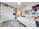 Cozy bedroom with built-in closet and wood-look flooring at 961 Whisler Ct, Saint Cloud, FL 34769