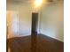 Large main bedroom with wood floors and walk-in closet at 2884 Grasmere View Pkwy, Kissimmee, FL 34746