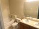 Bathroom features a double vanity and garden tub at 2884 Grasmere View Pkwy, Kissimmee, FL 34746