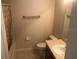Clean bathroom with shower/tub combo and vanity at 2884 Grasmere View Pkwy, Kissimmee, FL 34746