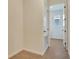 Laundry room with washer, dryer, and access to additional storage at 4244 Sawtooth Ct, Tavares, FL 32778