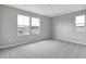 Bright bedroom with neutral walls and carpet at 4255 Sawtooth Ct, Tavares, FL 32778