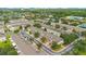 Aerial view showing townhouses and surrounding area at 3508 Sanctuary Dr, St Cloud, FL 34769