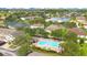 Aerial view of community pool with lounge chairs at 3508 Sanctuary Dr, St Cloud, FL 34769