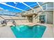 Private screened pool with lounge chairs at 880 Pebble Beach Dr, Davenport, FL 33896