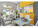 Bright dining area with glass table and seating for six at 880 Pebble Beach Dr, Davenport, FL 33896