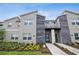 Modern three-unit building with stone accents at 880 Pebble Beach Dr, Davenport, FL 33896
