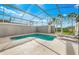 Private screened pool and patio area at 880 Pebble Beach Dr, Davenport, FL 33896