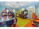 Fun game room, featuring air hockey, racing games, and more! at 880 Pebble Beach Dr, Davenport, FL 33896