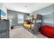 Bedroom with bunk beds and dresser at 880 Pebble Beach Dr, Davenport, FL 33896