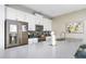 Modern kitchen with white cabinets and stainless steel appliances at 880 Pebble Beach Dr, Davenport, FL 33896