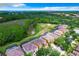 Aerial view of houses and community features at 1038 Orange Cosmos Blvd, Davenport, FL 33837