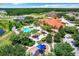 Community pool, clubhouse, playground, and landscaping at 1038 Orange Cosmos Blvd, Davenport, FL 33837