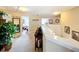 Upstairs hallway with access to bedrooms and bathroom at 1038 Orange Cosmos Blvd, Davenport, FL 33837