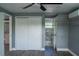 Bedroom with double doors leading to the bathroom at 1116 Madrid Ave, Daytona Beach, FL 32114