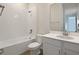 Clean bathroom with a tub, shower, and vanity at 308 Alexandrite St, Deland, FL 32720
