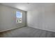 Bright bedroom with a window and carpet flooring at 308 Alexandrite St, Deland, FL 32720