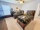 Twin bedroom with Batman theme, featuring two beds and city skyline wall art at 1921 Nice Ct, Kissimmee, FL 34747