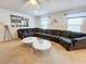 Spacious living area with sectional sofa and two coffee tables at 1921 Nice Ct, Kissimmee, FL 34747