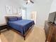 Bright bedroom with a king-size bed and plenty of floor space at 1921 Nice Ct, Kissimmee, FL 34747