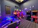 Community game room with air hockey and arcade games at 1921 Nice Ct, Kissimmee, FL 34747