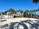 Beach volleyball court with sand and palm trees at 1921 Nice Ct, Kissimmee, FL 34747