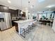 Modern kitchen with stainless steel appliances and an island at 1921 Nice Ct, Kissimmee, FL 34747