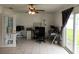 Home office with desk, chair, and access to backyard at 2518 Bowmer Dr, Kissimmee, FL 34744