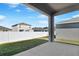 Covered patio overlooking a fenced backyard at 2027 Stetson Ct, Eagle Lake, FL 33839