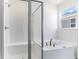 Spa-like bathroom with soaking tub and walk-in shower at 2027 Stetson Ct, Eagle Lake, FL 33839