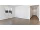 Bright and airy living room with tile floors and access to hallway at 2027 Stetson Ct, Eagle Lake, FL 33839