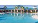 Reflecting pool with clubhouse in the background at 3725 Pacific Ln, Davenport, FL 33897
