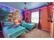Two twin beds in a themed bedroom with a mural and accent lighting at 3725 Pacific Ln, Davenport, FL 33897