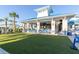 Community clubhouse with a bar and outdoor seating at 3725 Pacific Ln, Davenport, FL 33897