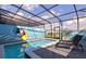 Enjoy this refreshing pool with a Mickey Mouse mural at 3725 Pacific Ln, Davenport, FL 33897