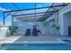 Pool area with a relaxing Disney-themed mural and lounge chairs at 3725 Pacific Ln, Davenport, FL 33897