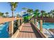 Wooden footbridge leading to a resort-style pool area at 3725 Pacific Ln, Davenport, FL 33897