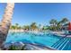 Large resort-style pool with water features and lounge chairs at 3725 Pacific Ln, Davenport, FL 33897
