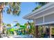 Resort-style water park with slides and a cabana at 3725 Pacific Ln, Davenport, FL 33897