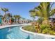 Relaxing lazy river winding through lush tropical landscaping at 3725 Pacific Ln, Davenport, FL 33897