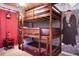 Triple bunk beds in a themed bedroom with Harry Potter decor at 3725 Pacific Ln, Davenport, FL 33897