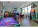 Fun game room with air hockey and arcade games at 3725 Pacific Ln, Davenport, FL 33897