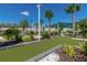 Mini golf course with palm trees and landscaping at 3725 Pacific Ln, Davenport, FL 33897